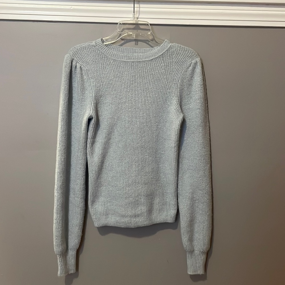 light blue sweater